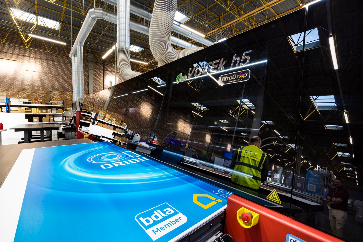 Image of GES graphics printer in the warehouse in action