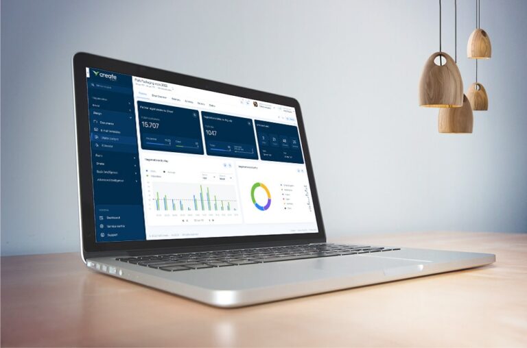 : Laptop displaying event organiser dashboard using Visit by GES, event intelligence